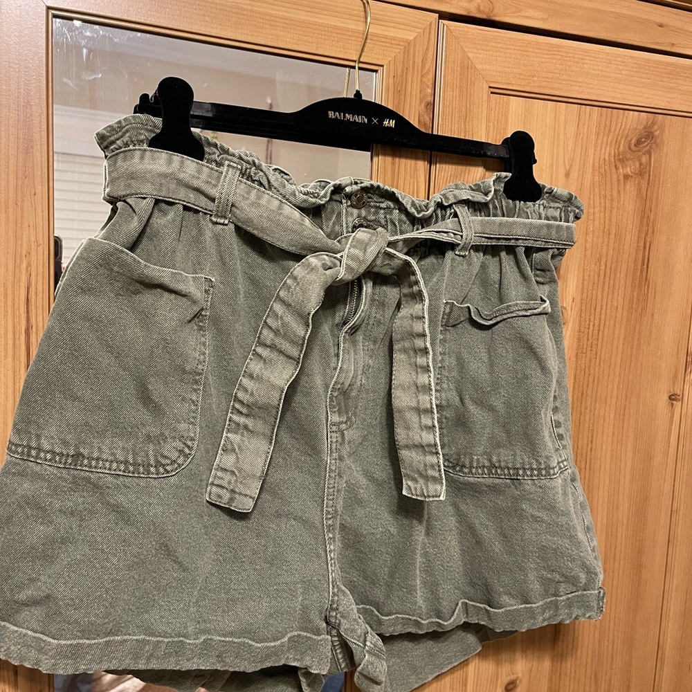 green denim shorts